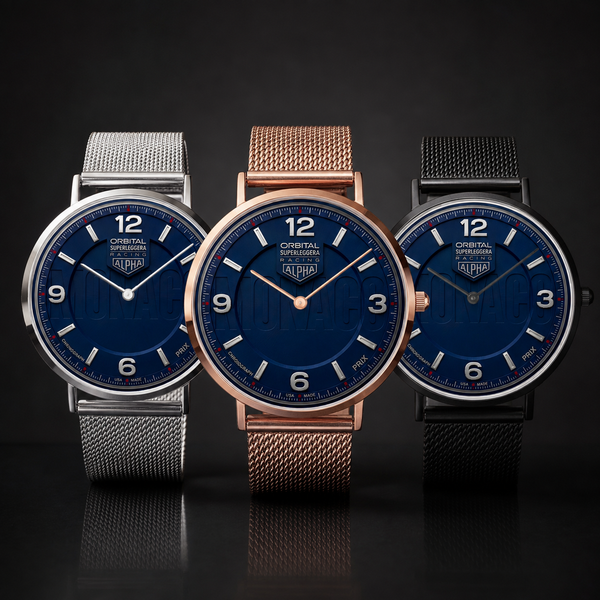 Three ALPHA Crystal Sports watches with deep blue dials and mesh straps, shown in silver, rose gold, and black metal finishes against a dark background.