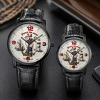Two wristwatches with black leather straps and round black cases, featuring a Popeye the Sailor graphic on a white dial. One watch is large and the other is smaller, both displayed on a dark textured surface with a leather case partially visible in the background.