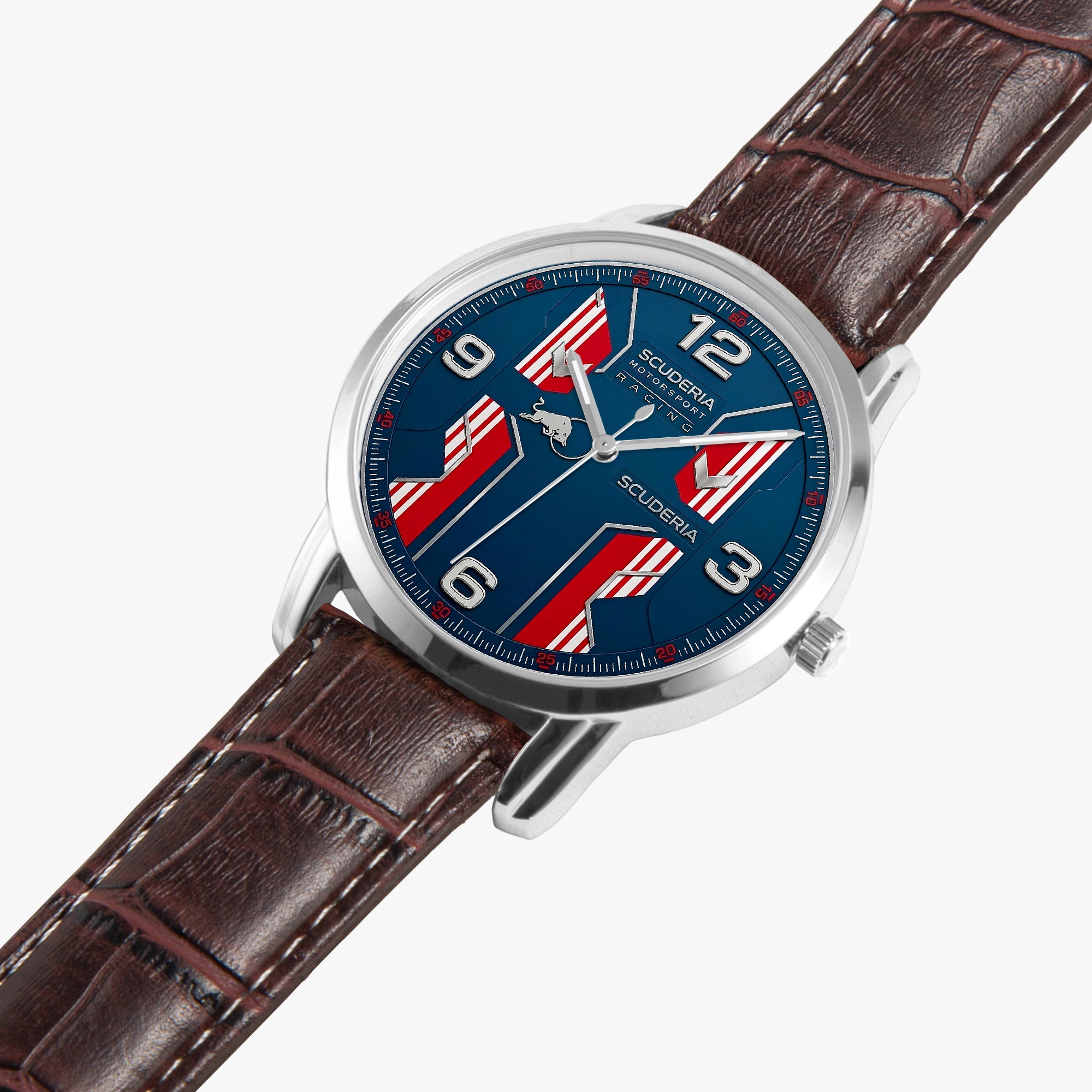 A close-up of a Scuderia Ferrari watch with a blue dial featuring red and white striped flag graphics, a silver-tone case, and a brown leather strap on a light gray background.