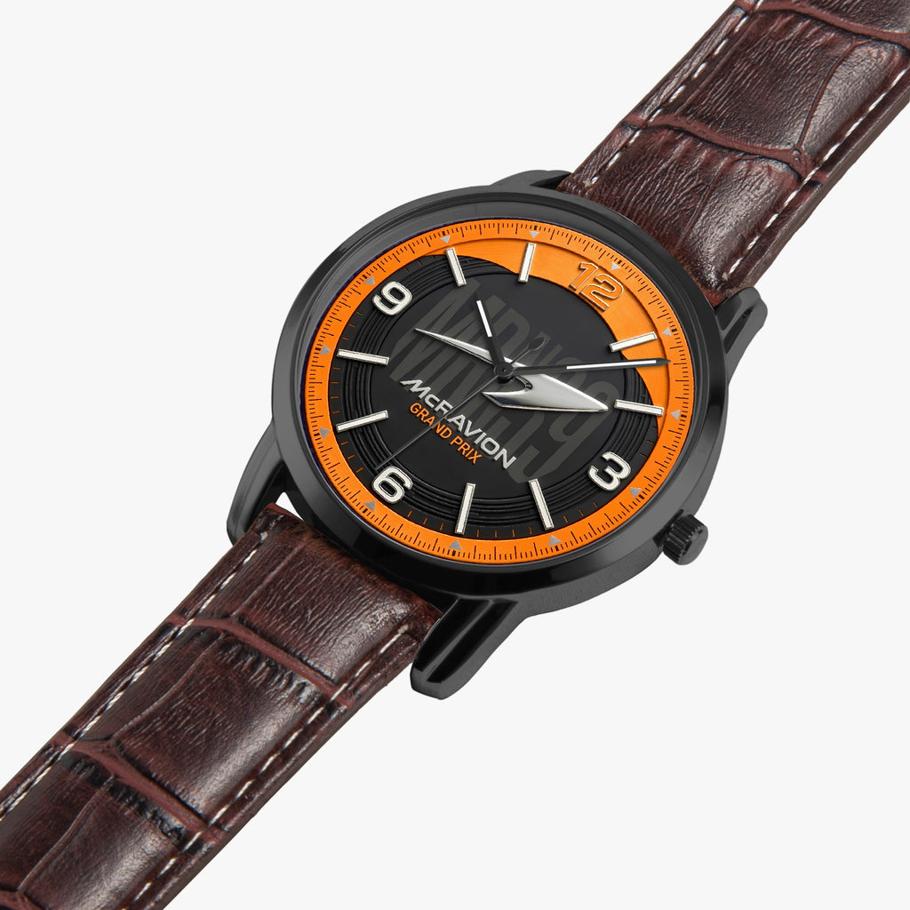 A wristwatch with a black case, black dial, bright orange ring around the dial, and a brown leather strap on a light gray background.