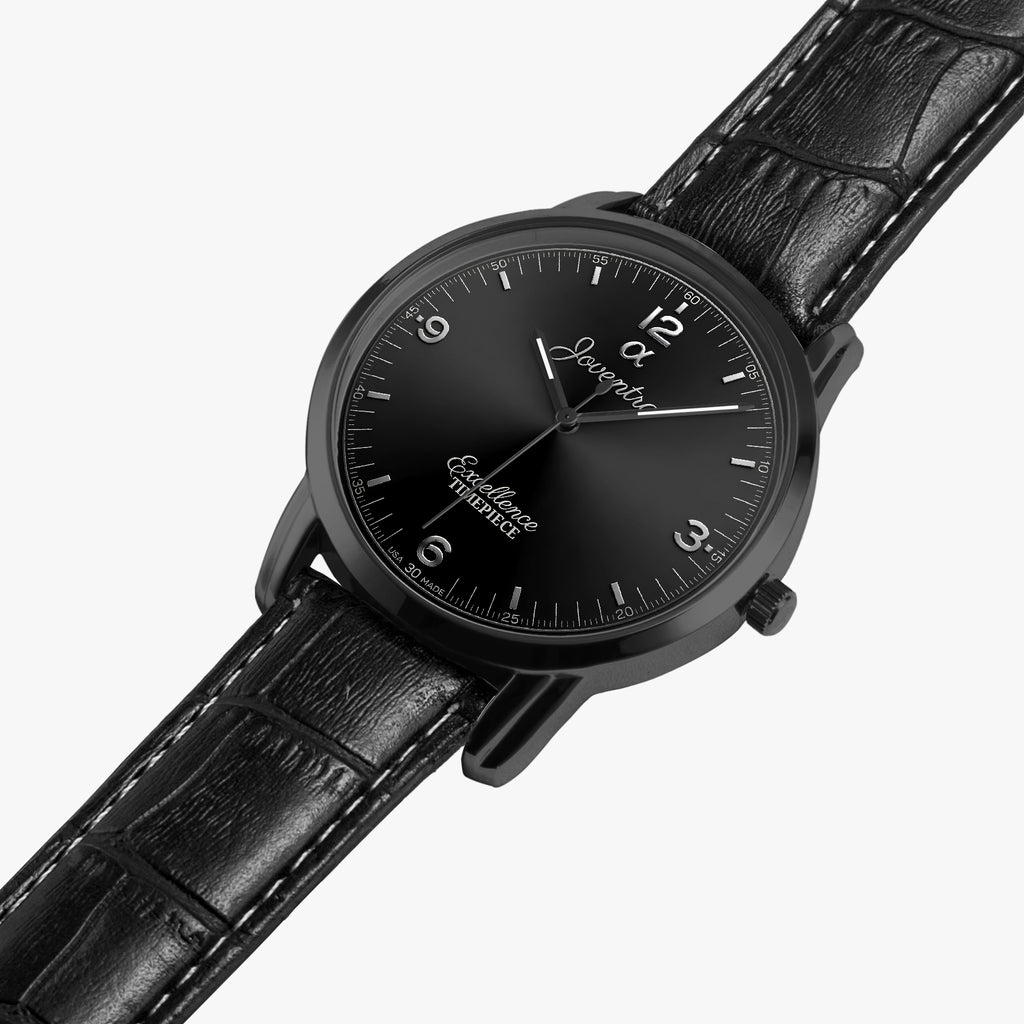 A black analog watch with a black leather strap, black round case, and a black dial featuring white Arabic numerals and hands, shown on a light gray background.