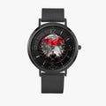 A black analog watch with a textured mesh strap and a round black dial featuring a red bat-like emblem and a dark fantasy-style graphic on the face, shown against a light gray background.
