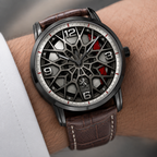 Joventra Monaco Apex F1 Racing Watch worn on wrist, showing 3D wheel rim dial detail
