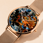 A Joventra Celestial abstract fluid art watch, alternate angle, showing case and mesh strap detail.