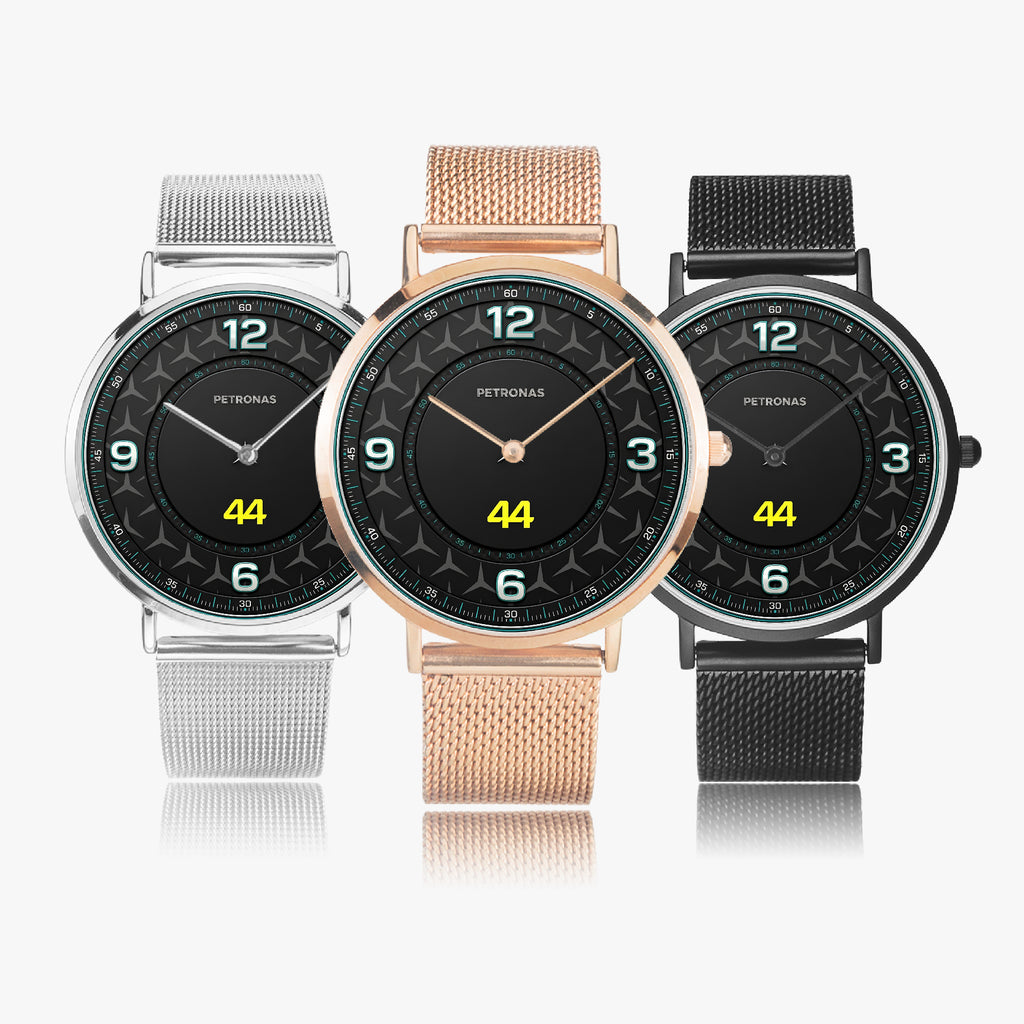 Three Petronas smartwatches with black digital faces and star patterns, shown side by side in silver, rose gold, and black metal cases with mesh straps on a light gray background.