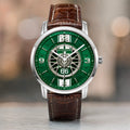 Joventra 1967 GT watch dial featuring a racing green sunburst finish, white rally stripes, wheel rim motif, and number 66.