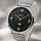 Grand Prix motorsport Joventra watch with dark geometric dial, cyan accents, and silver stainless steel mesh strap.