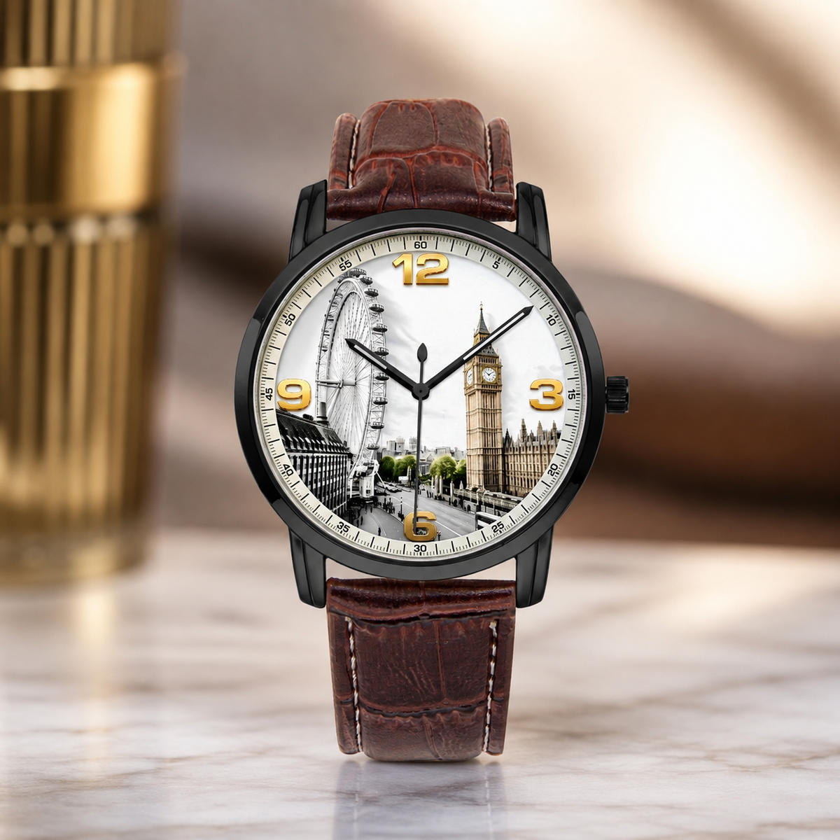 A wristwatch with a brown leather strap and a round black case, featuring a London-themed dial with Big Ben and the London Eye. The watch is displayed on a marble surface with a blurred background.