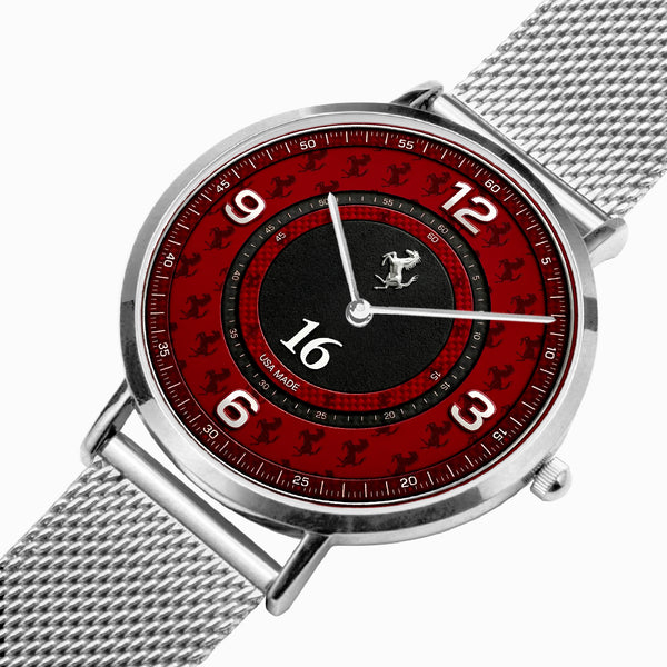 A silver-tone stainless steel wristwatch with a mesh strap, featuring a red dial with black racing-inspired graphics, white Arabic numerals, and a black 16-hour sub-dial.