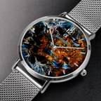 A close-up of a Joventra Celestial wristwatch with a silver mesh metal band and a round silver case. The dial features an abstract, textured painting with black, blue, orange, and gold tones.