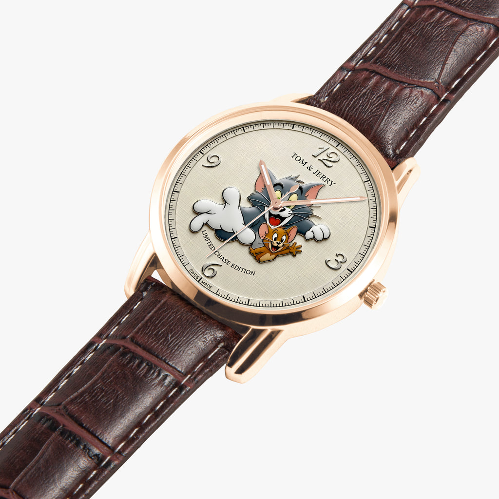Tom and Jerry themed watch with a rose gold case, cream dial featuring cartoon characters, and a dark brown leather strap on a light gray background.