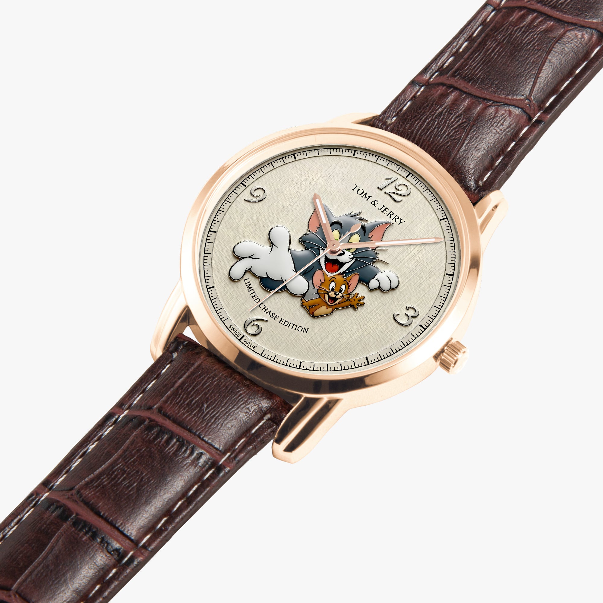 Tom and Jerry themed watch with a rose gold case, cream dial featuring cartoon characters, and a dark brown leather strap on a light gray background.