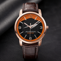 Joventra McRavion Grand Prix unisex racing watch in a rose gold stainless steel case with a black and orange racing dial and brown textured leather strap.