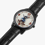A round analog watch with a black case and black leather strap, featuring a white dial printed with a cartoon character skiing. The dial has red Arabic numerals and a blue inner ring.
