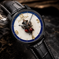 A close-up of a luxury watch with a black leather strap, black case, and a highly detailed white dial featuring a 3D figure of a warrior and the brand name 'JOVENTRA'.