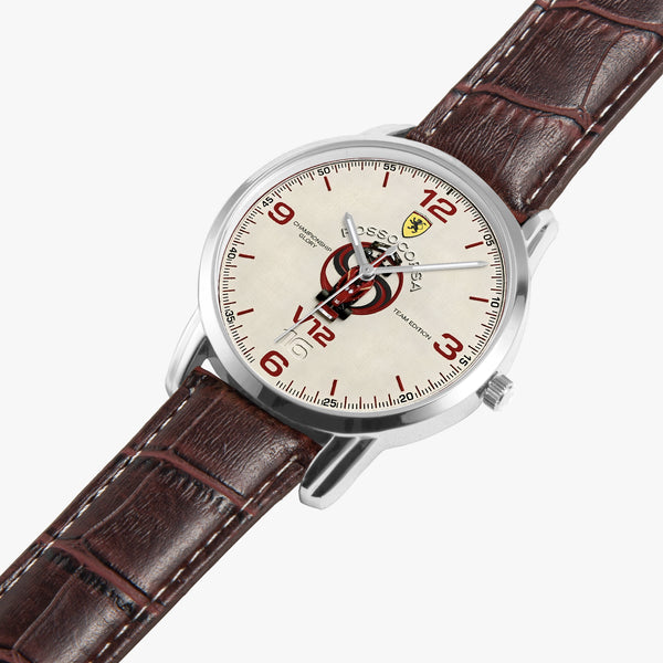 A close-up of a Team Edition wristwatch with a silver stainless steel case, cream-colored dial with red and black details, and a brown alligator-textured leather strap, set against a plain white background.