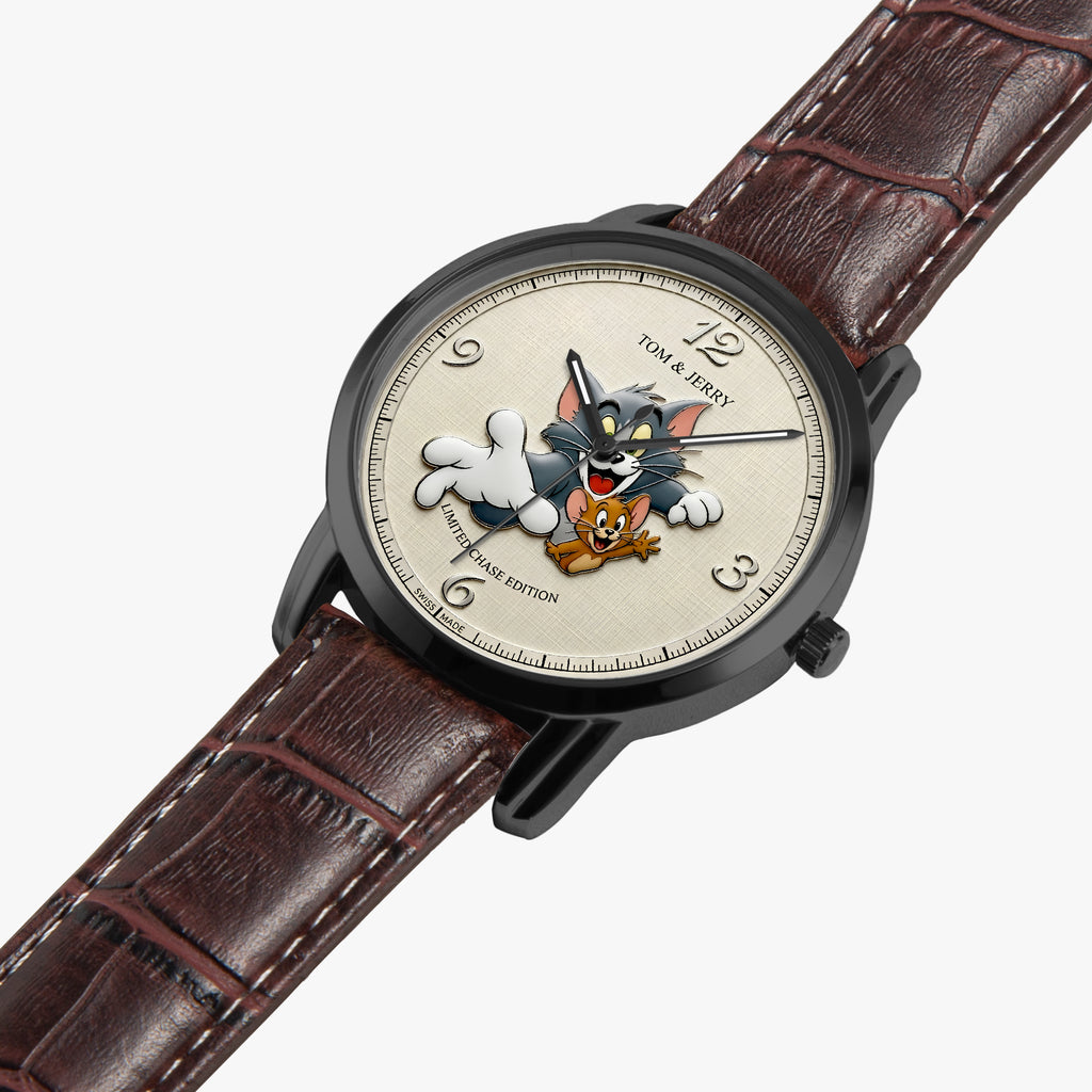 Tom and Jerry 40th Anniversary Edition wristwatch with a black case, cream dial featuring Tom and Jerry characters, and a brown leather strap on a light gray background.